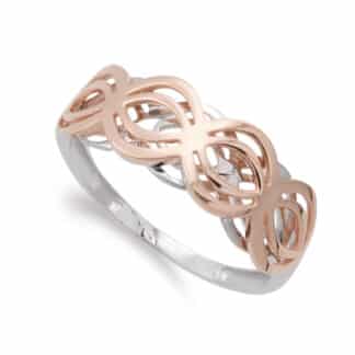 Sortija Oro Blanco Y Rosa Motivos Calados. Ancho: 7 Mm